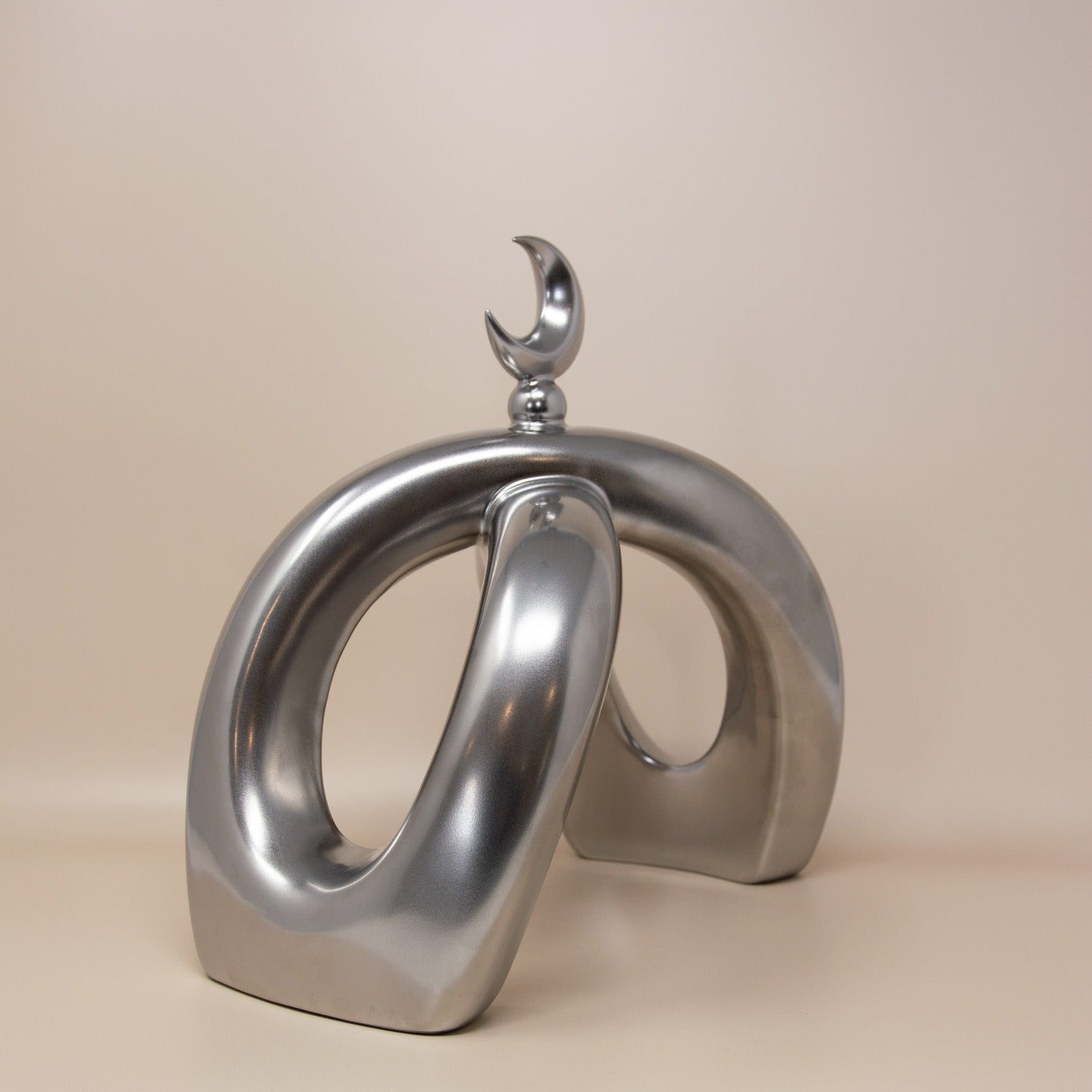 Crescent Knot Sculpture: Chrome